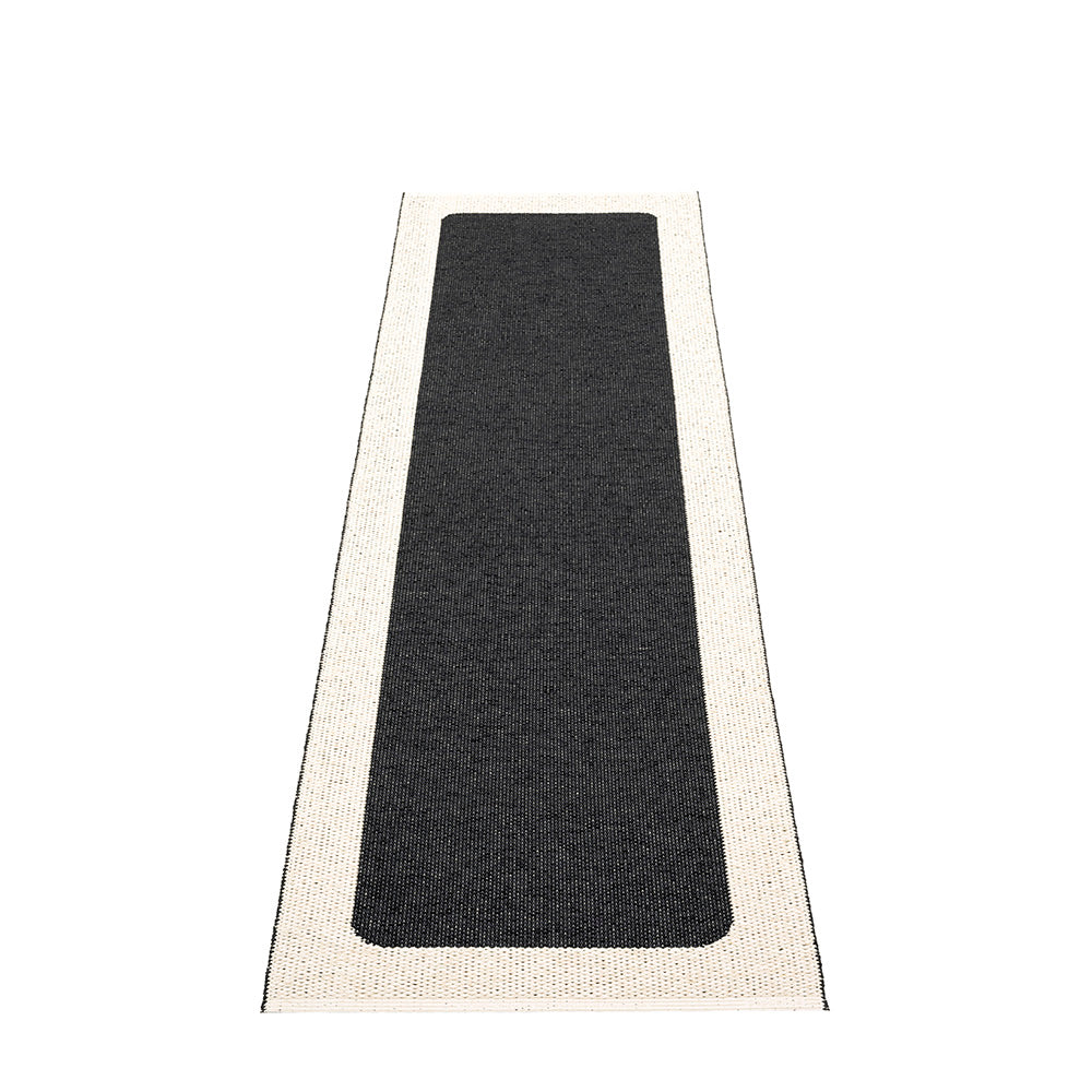 Pappelina Ilda Black -Vanilla Reversible 2.25 x 6 ft Rug
