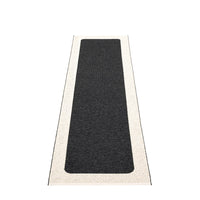 Pappelina Ilda Black -Vanilla Reversible 2.25 x 6 ft Rug