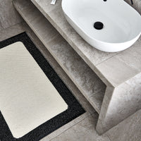 Pappelina Ilda Black -Vanilla Reversible 2.25 x 6 ft Rug